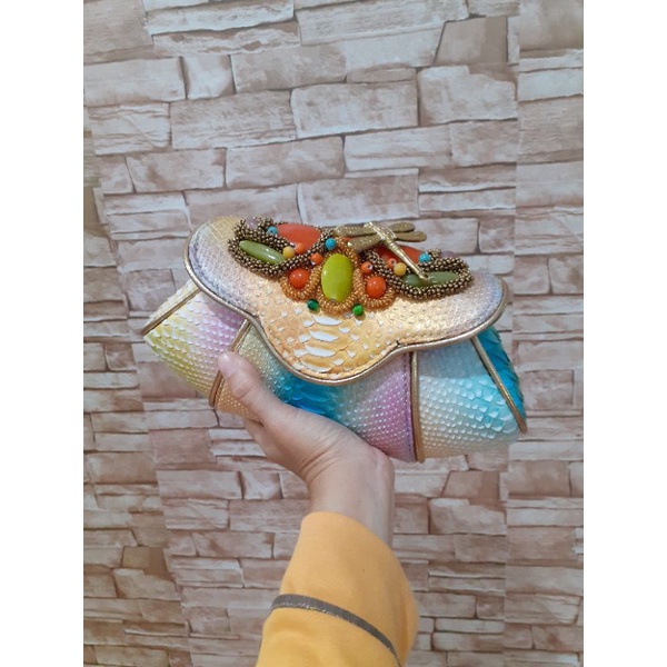 Tas pesta model keong