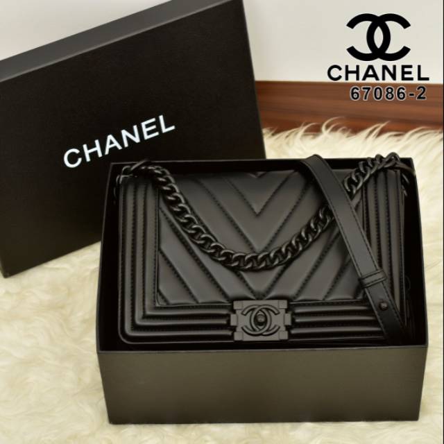 A. *CHANEL Boy Bag 67086-2  (08)*