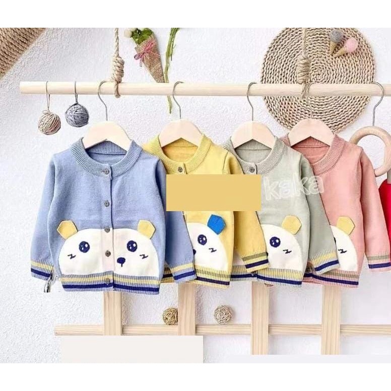 Sweater Rajut Kancing Tengah 70-100 ( Motif Random )