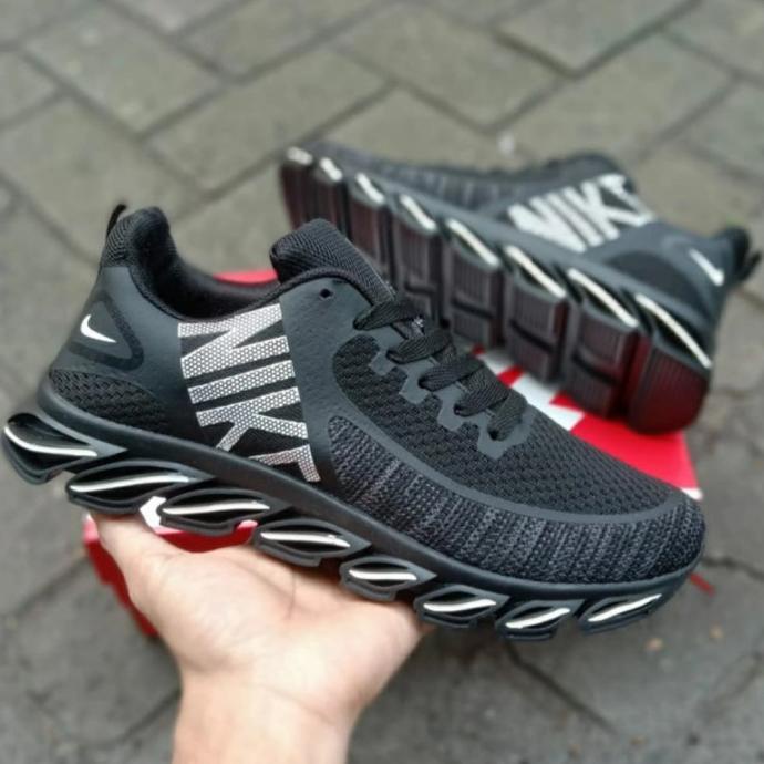 sepatu springblade merah nike running pria original Terbaik