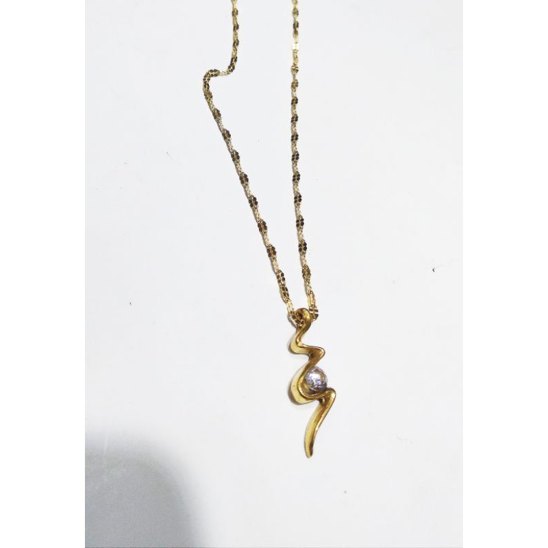 kalung titanium liontin mata gold 003