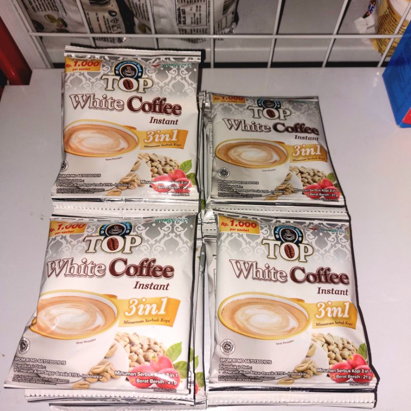 

Top White Coffee Isi 12 Sachet X 21 GramTop White Kopi