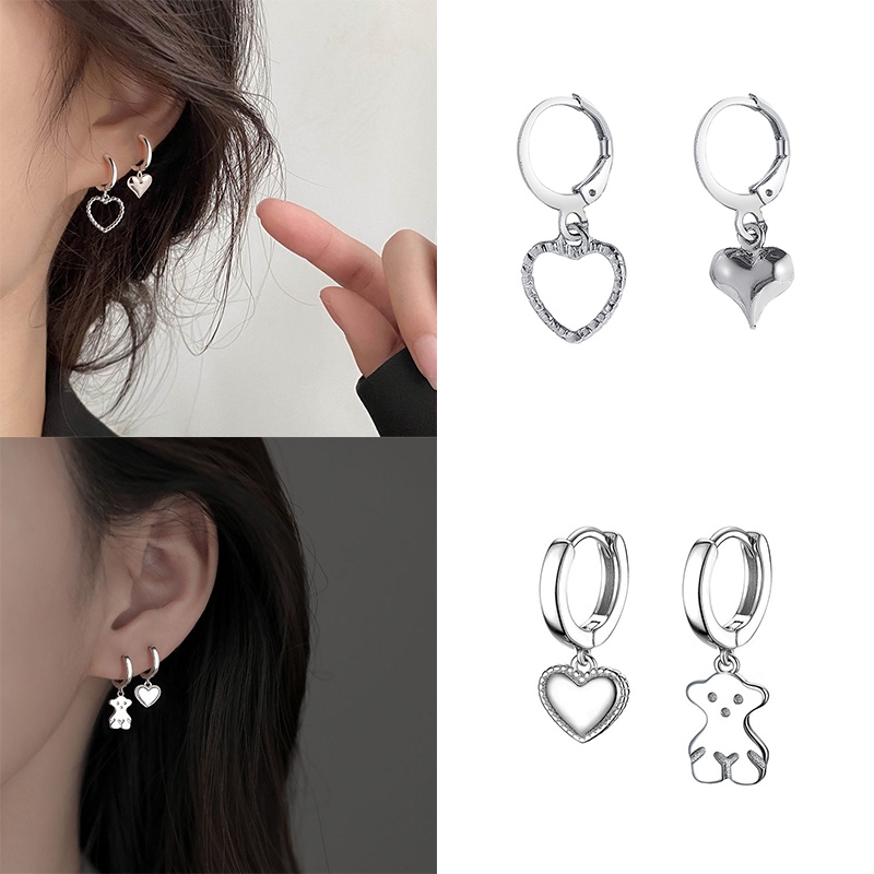 2pcs / Set Anting Bentuk Hati Hollow Bahan Metal Warna Silver Untuk Wanita