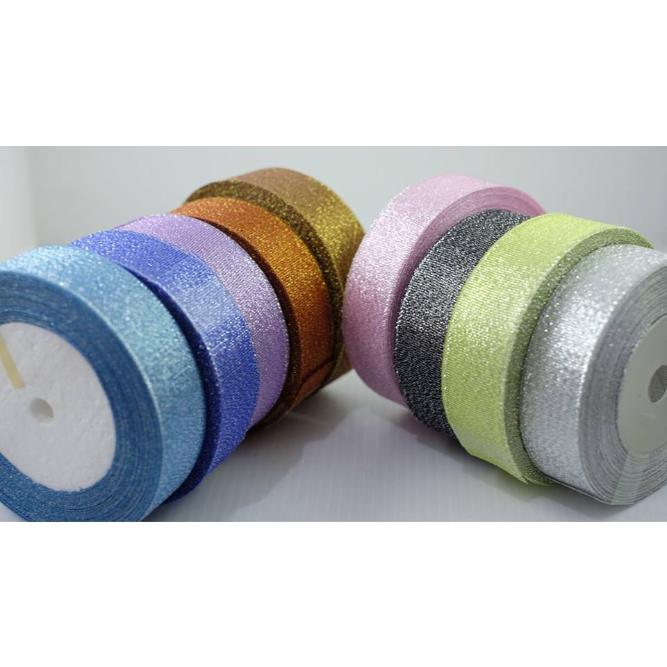 

Pita Glitter Ukuran 2,5 cm Per Roll Panjang 20 YARD Import Untuk Hampers Dekorasi Parcel Hiasan Bucket Termurah