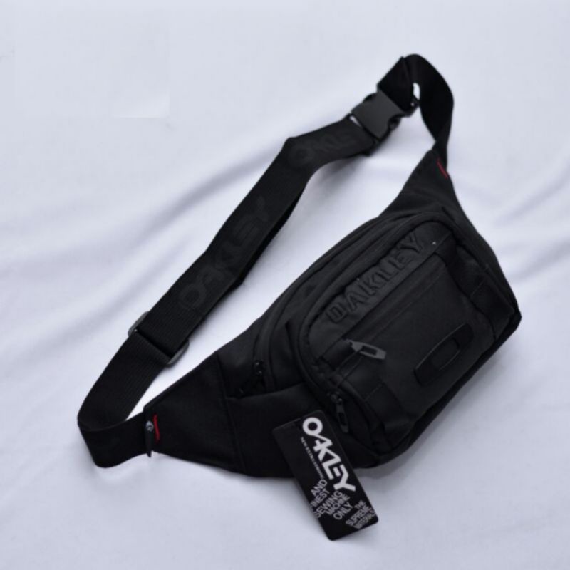 Tas Oakley Slempang Tas Surfing Oakley logo Besi / Tas waistbag distro / Tas Slempang Pria / Waistbag Pria