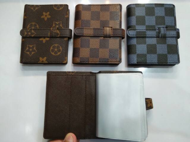 Dompet kartu tusuk album