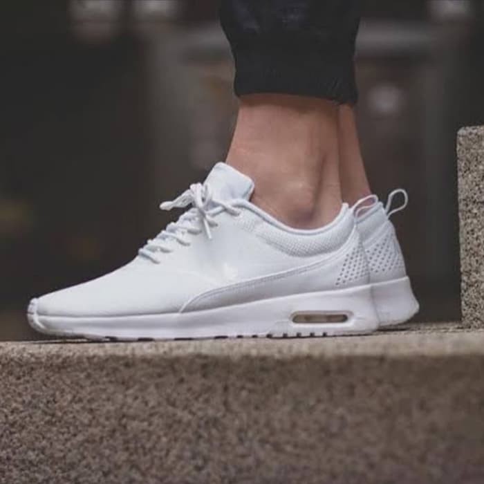 nike thea triple white