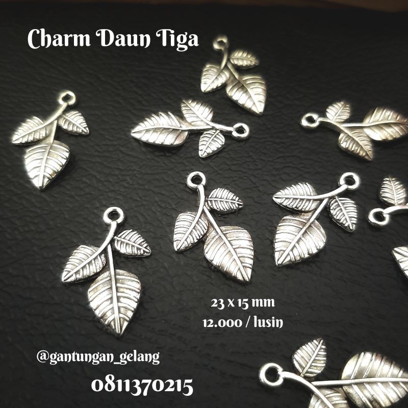 

charm daun tiga per lusin