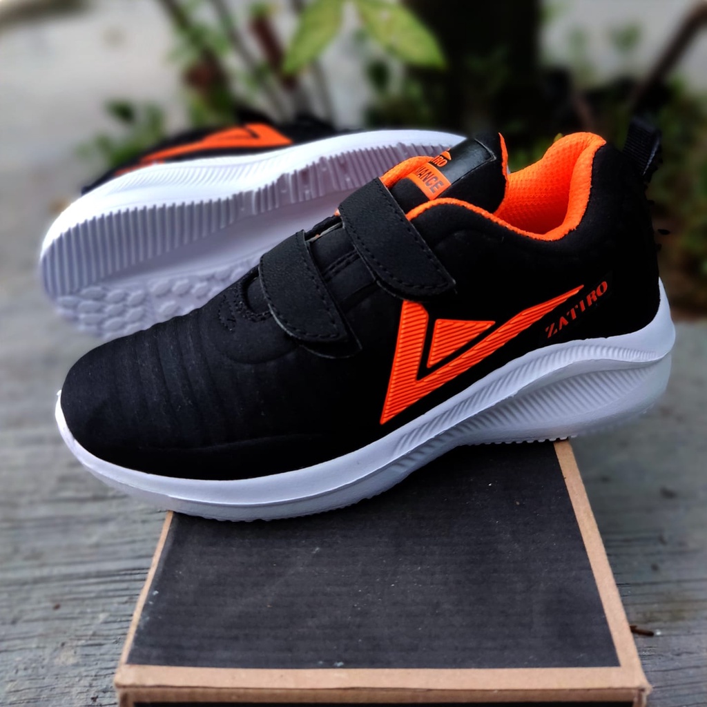 Sepatu Sport Sekolah Sneaker Olahraga Keren Stylish Anak Laki Perempuan Kecil Tanggung Umur TK SD Warna Hitam Rekat Velcro Tanpa Tali Safety