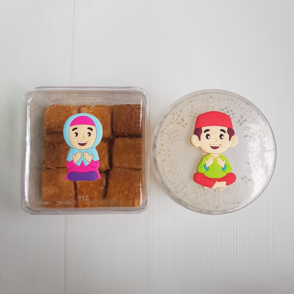 

Toppeer boneka Idul Fitri