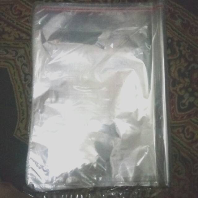 Opp Plastik baju 28x35 /  plastik prepetan baju