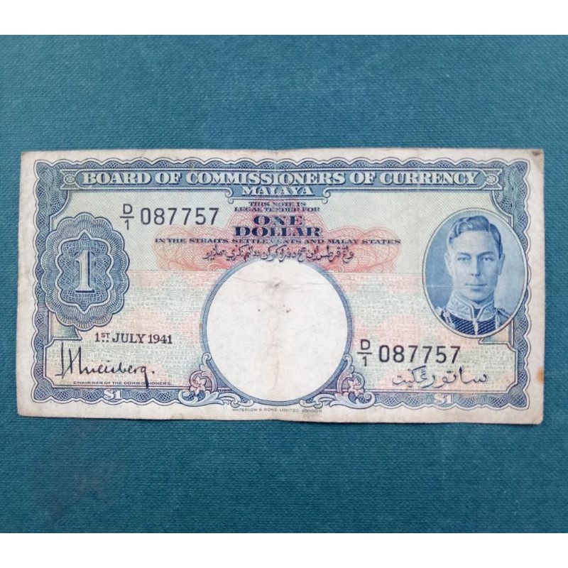 uang kuno 1 DOLLAR MALAYA