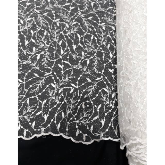 Tile Akar Mutiara Putih