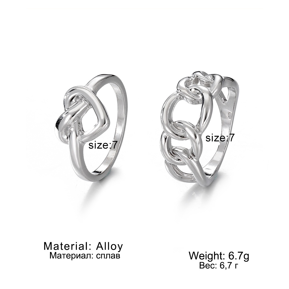 Set Cincin Bentuk Hati Model Hollow Warna Silver Gaya Punk Untuk Wanita