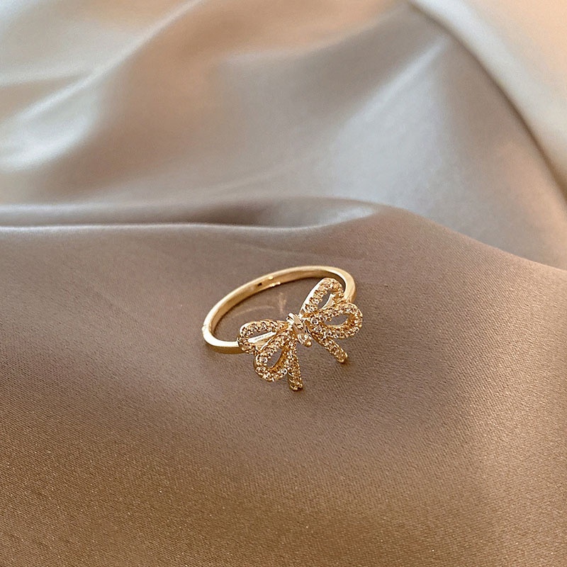 Cincin Jari Telunjuk Adjustable Desain Pita Full Berlian Imitasi Untuk Wanita