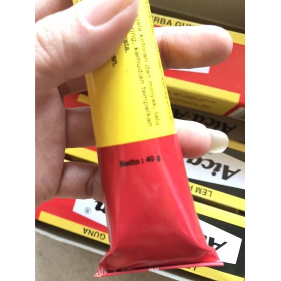 

Modern.. Lem AICA AIBON Tube 40 gr. Lem serba guna . Lem kuning . Lem karet , plastik, kayu, kulit