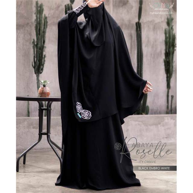 white and black abaya
