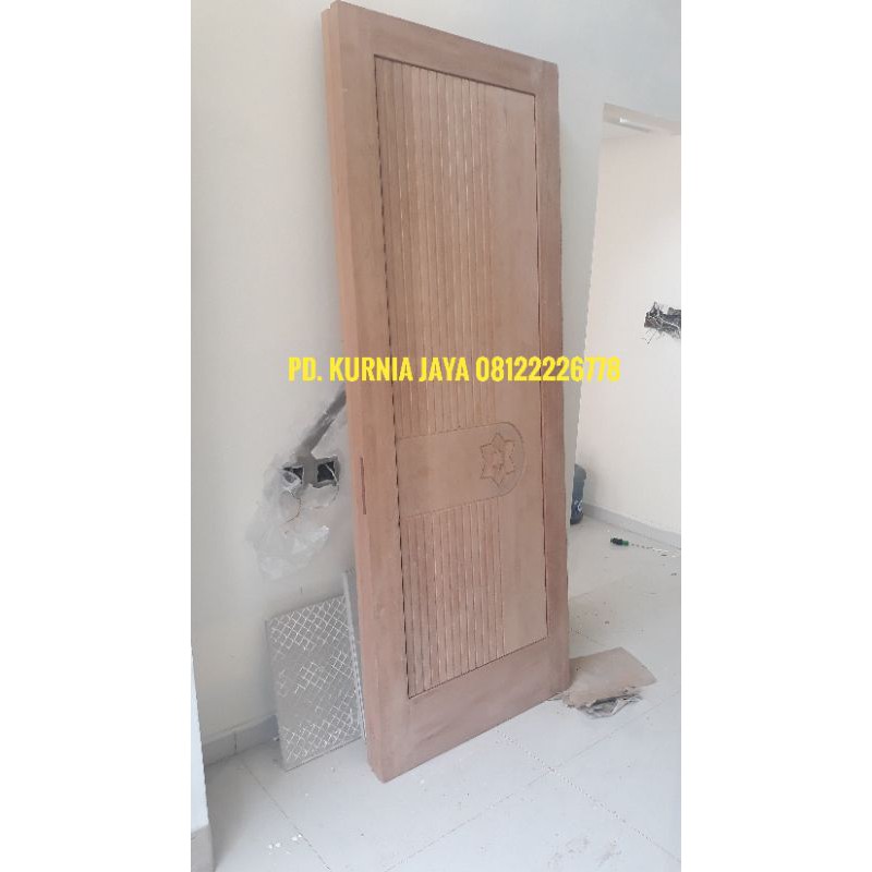 Daun Pintu Minimalis Motif ukir Kayu Kamper samarinda Oven