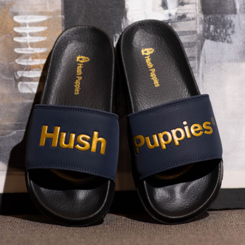 Sanda Hush Puppies Navy Gold Big Text Sandal Slide Pria