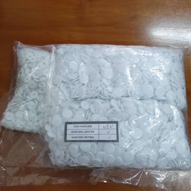 

Kancing plastic 15mm putih