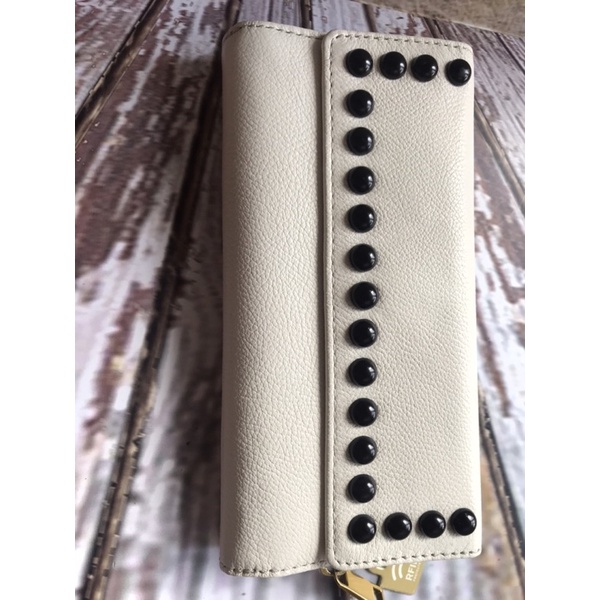 dompet fossil jori flap