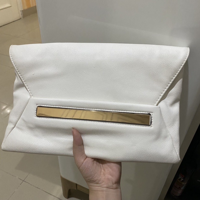 white clutch mango mng