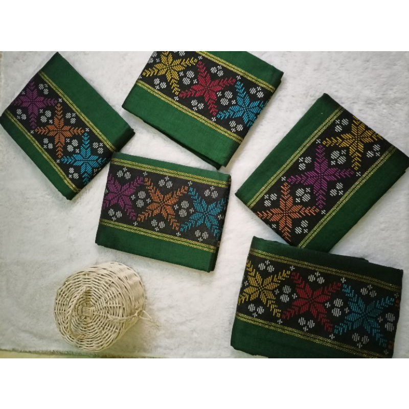 kain tenun motif batak