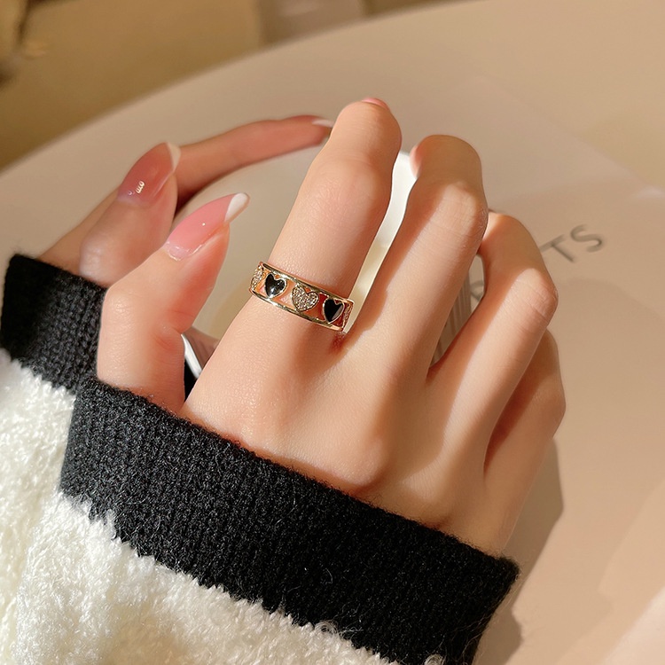 Cincin Model Terbuka Bahan Tembaga Desain Hati Hollow Gaya Korea Adjustable Untuk Wanita