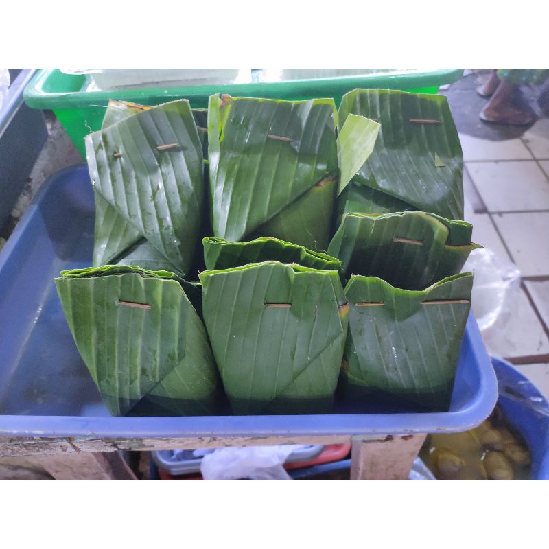 

Tapai/Tape singkong manis bungkus daun/kantong plastik