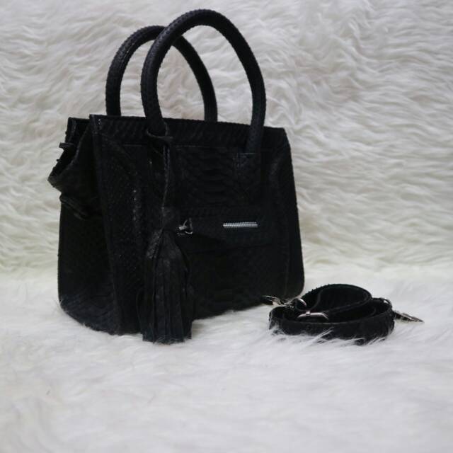 Tas kulit ular asli