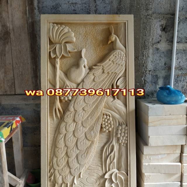 relief hiasan dinding batu ukir ornamen loster