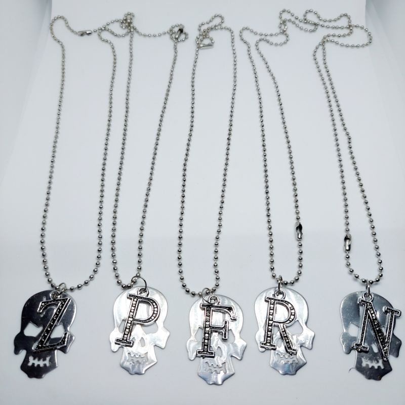 kalung metal huruf anti karat