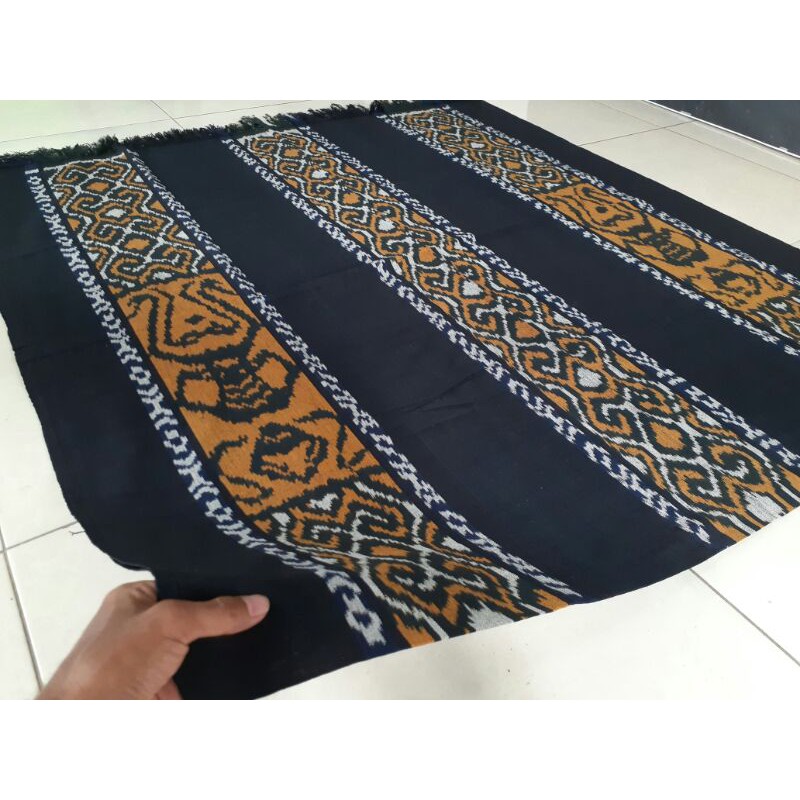 kain tenun etnik motif asmat