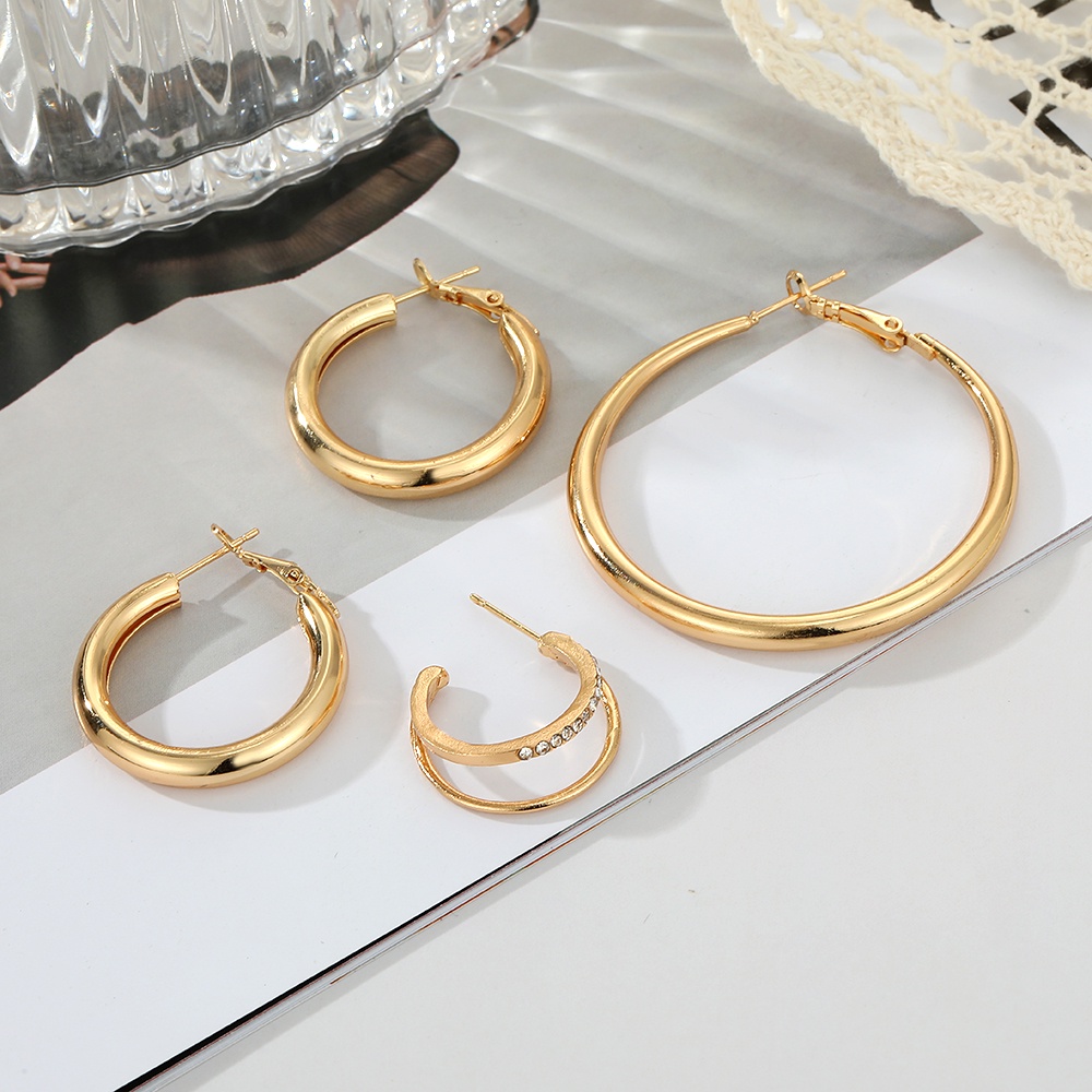 4pcs / set Anting Tusuk Bentuk Bulat / Bintang Bahan Metal Warna Emas Untuk Wanita