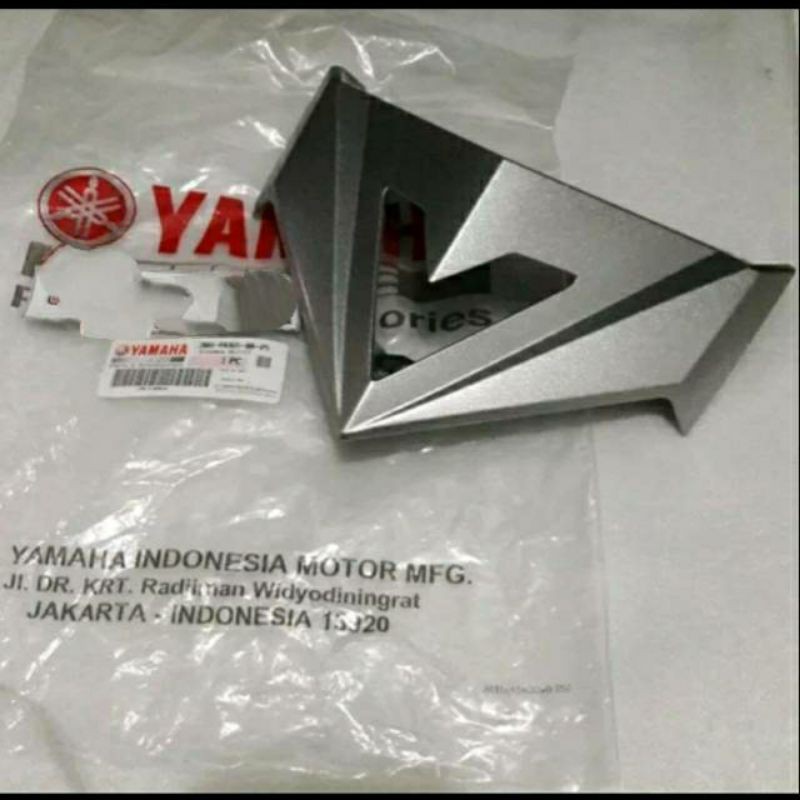 COVER LAMPU SENJA XRIDE 115 ORIGINAL YGP SILVER