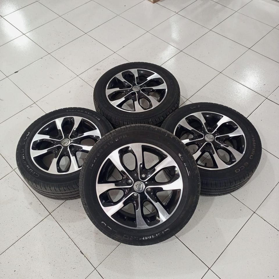 velg mobil bekas original standart nisan march ring 15x5,5 pcd 4x100 et50 + ban 185 60