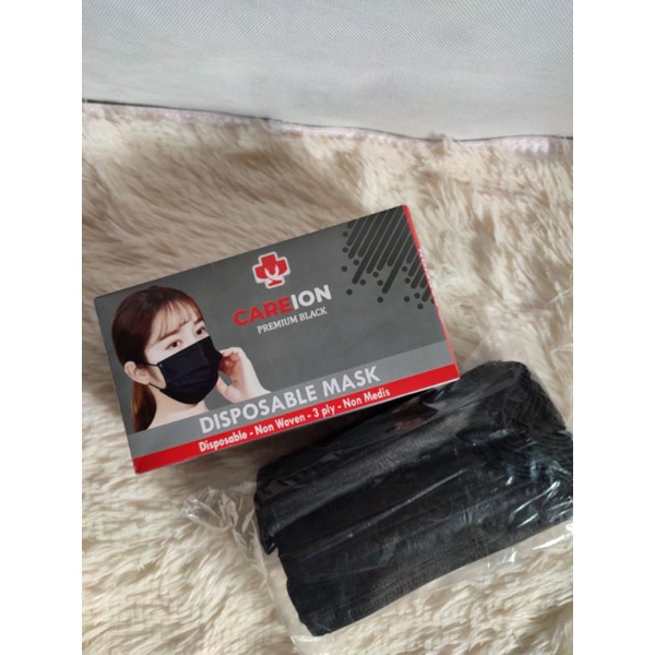 masker earloop hitam careion