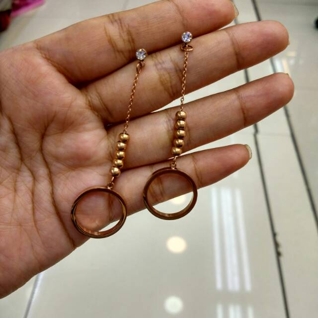 Anting cartier titanium