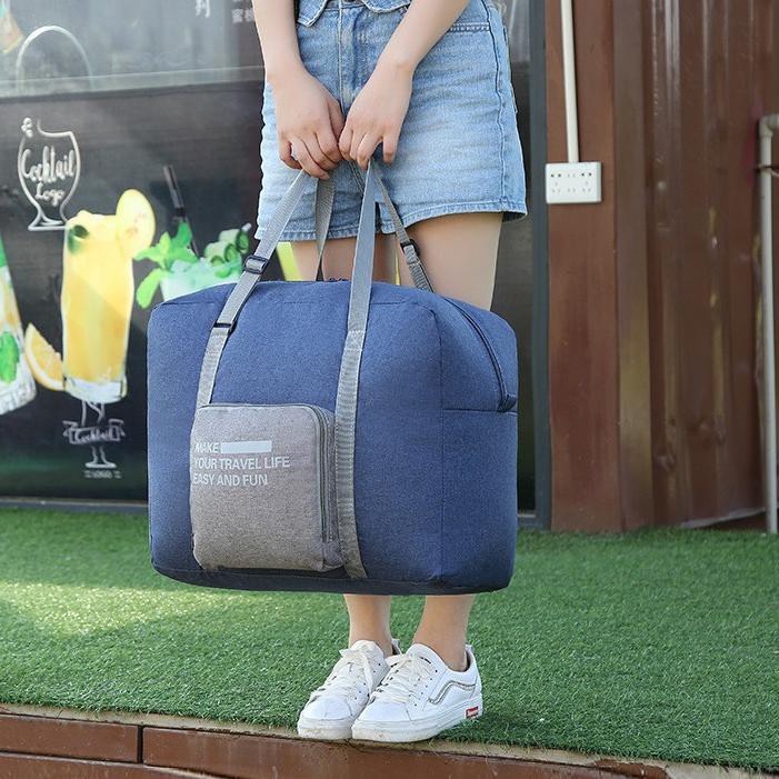 Produk Terlaris TAS TRAVEL LUGGAGE BAG BESAR IMPORT PRIA WANITA BISA JINJING ATAU TENTENG PENYIMPANA