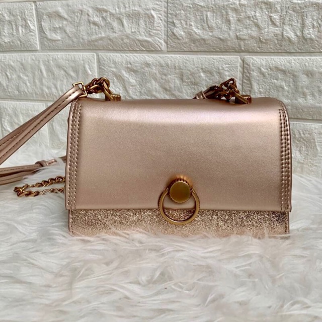 charles and keith rose gold bag