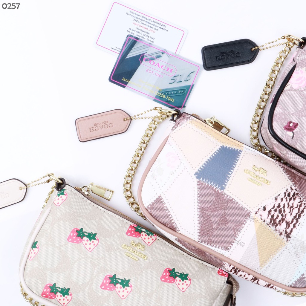 

Coach Kira Tag Crossbody Signature Canvas - MD0257