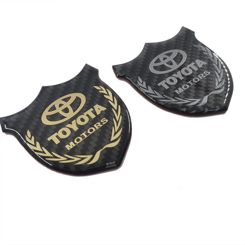 1pc Stiker Emblem Logo TOYOTA MOTORS Bahan Karbon Fiber Untuk Dekorasi Jendela Samping Mobil