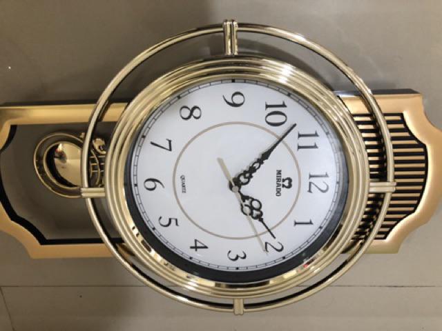 Jam Dinding Mirado Musik Bandul Goyang 937 Diameter 33cm
