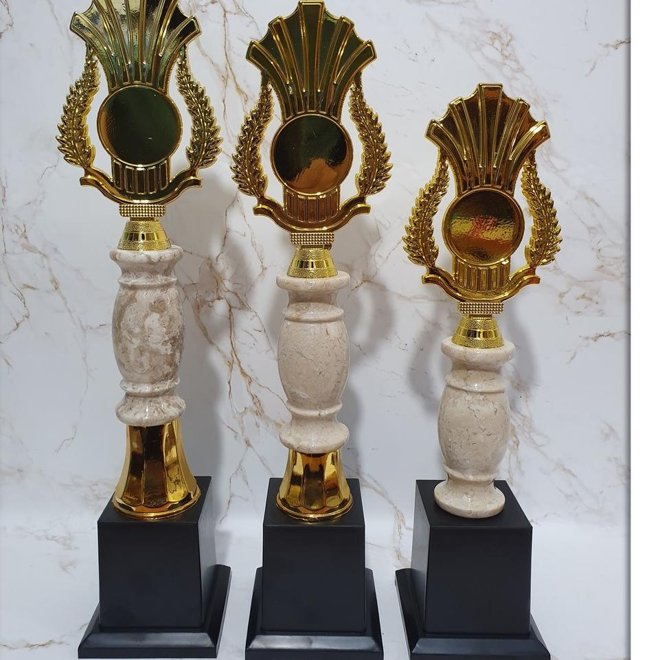 

➳ Piala / Trophy Murah tipe MT SET isi 3 buah dengan tulisan logo pita ➣