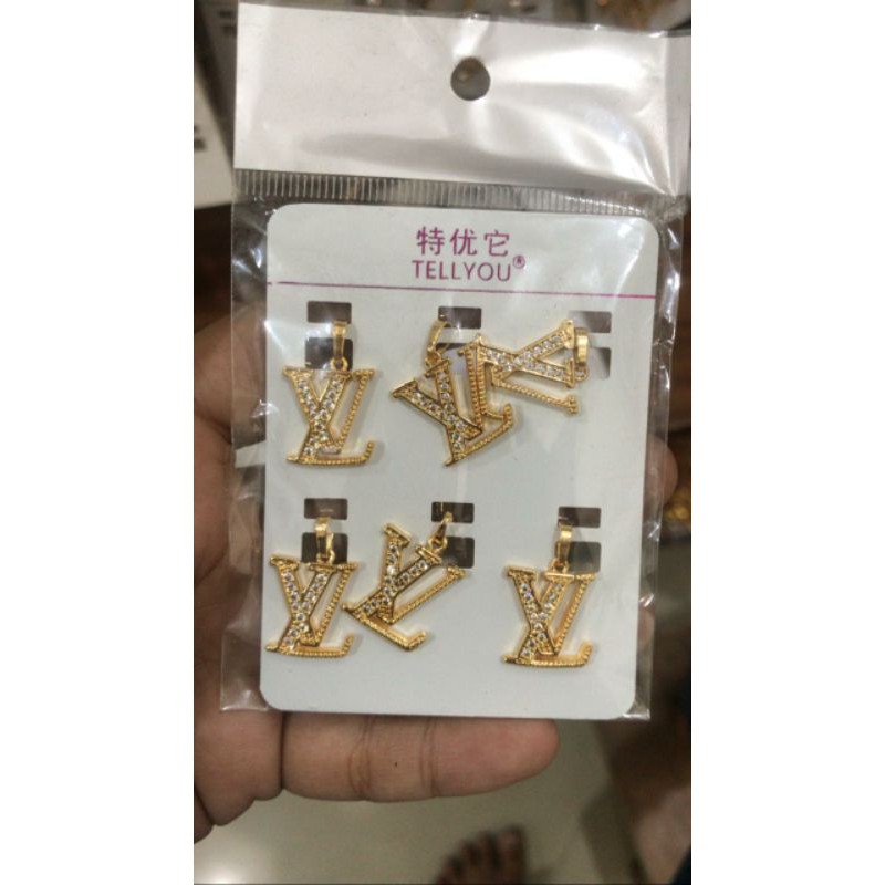 Liontin dewasa motif isi 6.