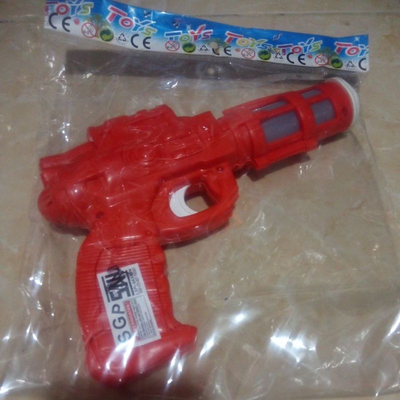 Pistol mainan anak pakai lampu dan musik