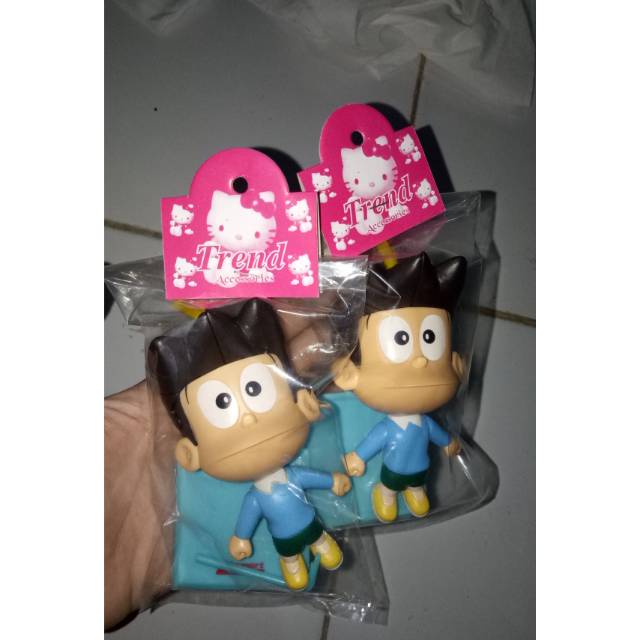Action figure boneka doraemon puzzle alfamart