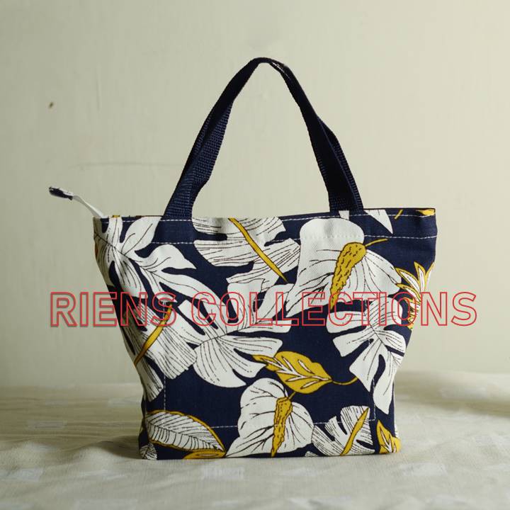 RIENS COLLECTIONS. HANDBAG KECIL BAHAN KANVAS MOTIF ANEKA DAUN BIRU