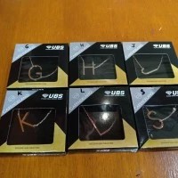 Kalung UBS Caren Delano Alphabet