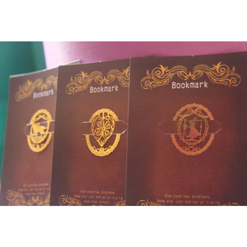 

gold metal bookmark
